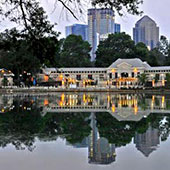 View of Greystone at night from across the lake
