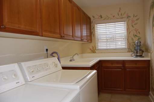 Nick&rsquo;s sister is really jealous of this spacious laundry room.